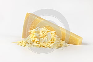 Whole and grated parmesan cheese photo