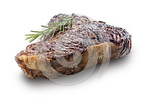 Whole grilled T-bone steak with rosemary