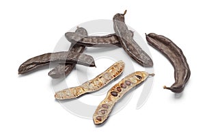 Whole and half Carob pods