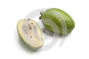 Whole and half fresh Feijoa fruit
