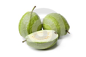 Whole and half fresh guava fruit