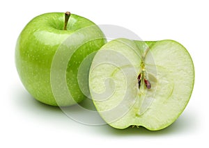Whole and half green apples isolated on white