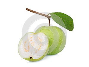 Whole and half of guava fruit with green leaf isolated on white