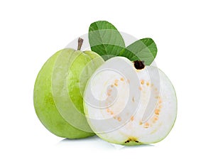 Whole and half guava fruit with green leaf isolated on white