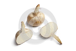 Whole and half Jicama roots