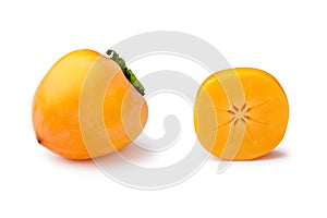 Whole and half persimmon isolated photo