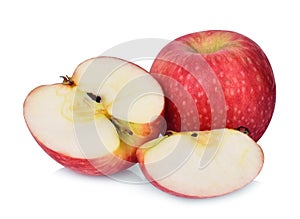 Whole and half pink lady apple isolated on white