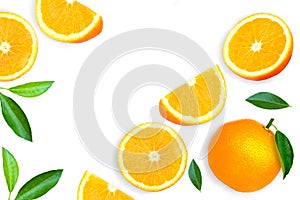 whole and half slice of ripe fresh organic orange fruit with green leaf isolated on white background.
