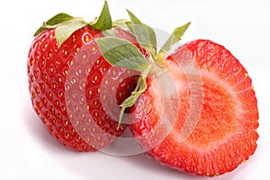 Whole and half strawberry