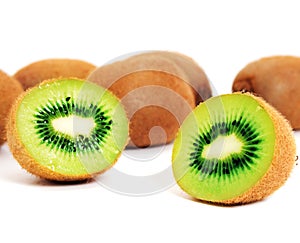 Whole and halved kiwifruit photo