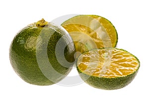 Whole and halved lime fruit