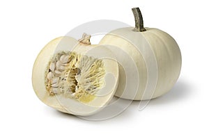 Whole and halved white Lumina pumpkin photo