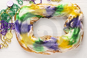 Whole King Cake with Mardi Gras Beads