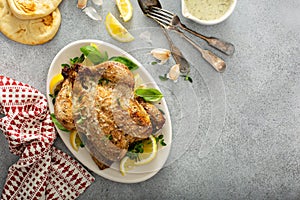 Whole lemon herbs and garlic roasted chicken