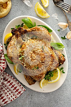 Whole lemon herbs and garlic roasted chicken