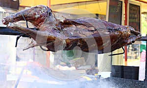 Whole meat roasting on a spit