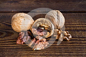 whole and open walnuts, walnut grain