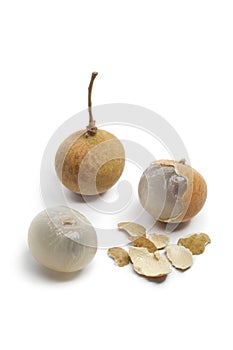 Whole and partial longan fruit photo