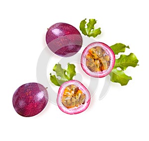 Whole passion fruits and a half  on white background with copy space.Top view