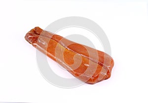 Whole piece of Bottarga, italian gastronomic specialty. It is made of salted, cured fish roe of gray mullet or bluefin tuna.