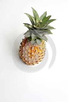 Whole Pineapple Fruit Isolated on White Surface.