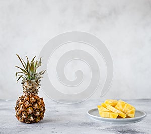 Whole pineapple fruit and sliced pineapple