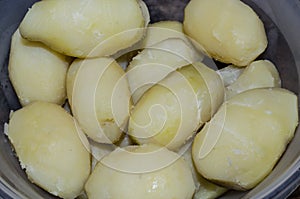 Whole potatoes, boiled and peeled. Ready to eat or cut up for salad or prepare as side dish.