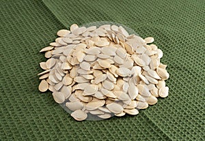 Whole Pumpkin Seeds in Shell Isolated, Raw Pepita Grains, Scattered Green Healthy Nuts