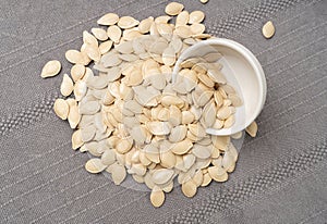 Whole Pumpkin Seeds in Shell Isolated, Raw Pepita Grains, Scattered Green Healthy Nuts