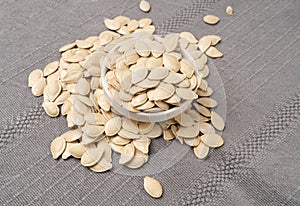 Whole Pumpkin Seeds in Shell Isolated, Raw Pepita Grains, Scattered Green Healthy Nuts