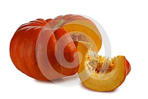 Whole pumpkin and slice on white