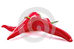Whole red bell pepper isolated on white