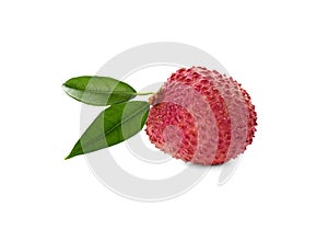 Whole ripe lychee fruit with green leaves isolated on white