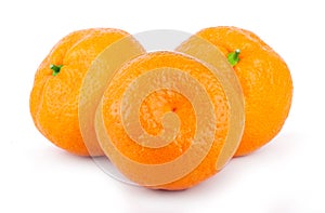 Whole ripe mandarin tangerine isolated on white background