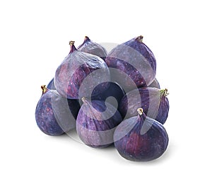 Whole ripe purple figs on white background
