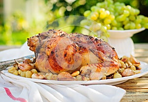 Whole Roast Chicken with Grapes, Garlic and Almonds