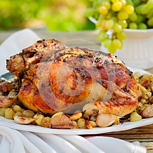 Whole Roast Chicken with Grapes, Garlic and Almonds