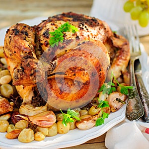 Whole Roast Chicken with Grapes, Garlic and Almonds