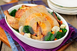 Whole Roast Chicken Stuffed with Bread and Cheese Served with St