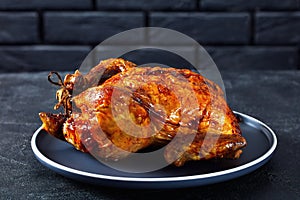 Whole roast chicken, turkey on a plate