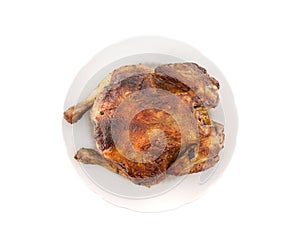 Whole roasted chicken isolated on white background. Top view