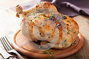 Whole roasted chicken with pepper and thyme