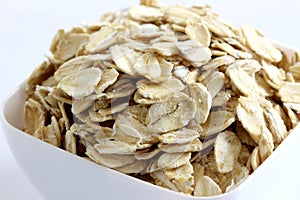 Whole Rolled Oats in White Bowl