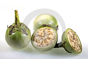 Whole and section of Thai white eggplant, Solanum melongena