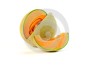 Whole and slice of japanese melons, orange melon or cantaloupe melon with seeds isolated on white