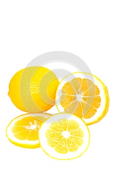 Whole and Sliced Bright Yellow Meyer Lemons photo