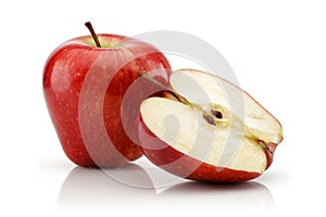 Whole and sliced red apples isolated on white