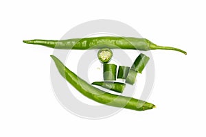 whole and slices lumbre green chili pepper isolated on white background top view photo