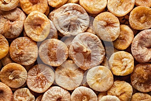 Whole sun dried figs as a background