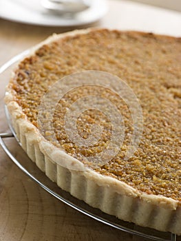 Whole Treacle Tart on a Cooling Rack